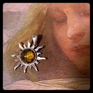 Green Amber and silver sun pendant